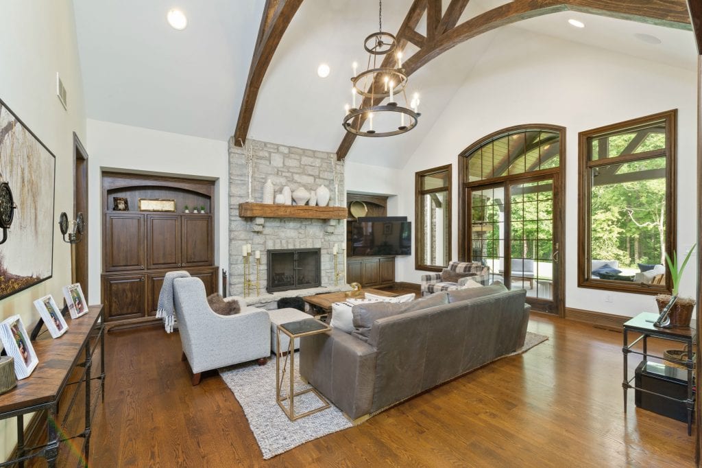 Hensley custom home Cincinnati family room with timber trusses 