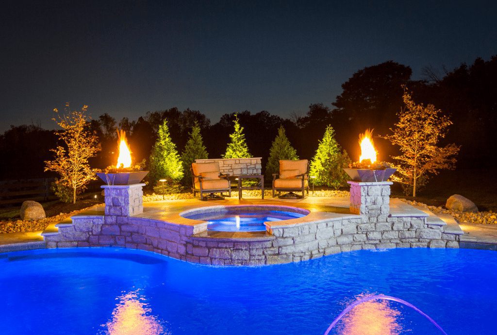 pool with seating area by spa