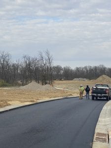 curbs paving and storm sewers in new roads