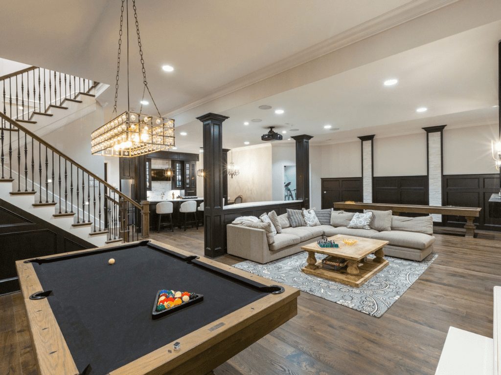 Game room and bar in a custom Indian Hill home